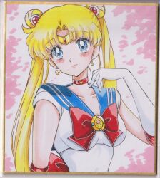  1girl bishoujo_senshi_sailor_moon blonde_hair blue_eyes blue_sailor_collar blush bow breasts chikoto_(kztc4472) choker circlet closed_mouth collarbone commentary crescent crescent_choker crescent_earrings curtained_hair double_bun earrings elbow_gloves gem gloves gold_circlet hair_bun hair_ornament hand_up highres jewelry leotard lone_nape_hair long_hair looking_at_viewer magical_girl medium_breasts parted_bangs photo_(medium) pink_background red_bow red_choker red_gem red_trim sailor_collar sailor_moon sailor_senshi_uniform shikishi short_sleeves smile solo traditional_media transformation_brooch_(sailor_moon) twintails upper_body very_long_hair white_gloves white_leotard 