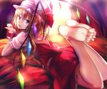 1girl barefoot blonde_hair fang flandre_scarlet hat hat_ribbon highres hizagawa_rau legs_up lying mob_cap on_stomach open_mouth pointy_ears puffy_short_sleeves puffy_sleeves red_eyes ribbon shirt short_sleeves side_ponytail skirt skirt_set smile solo touhou vest wings wrist_cuffs 