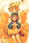  2girls bad_id blonde_hair brown_hair cat_ears cat_tail chen fox_tail hat kuronuko_neero multiple_girls multiple_tails red_eyes short_hair tail tail_hug touhou yakumo_ran 