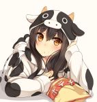  1girl :t akagi_(kantai_collection) alternate_costume animal_costume black_hair brown_eyes cow_costume eating food food_on_face highres kantai_collection long_hair looking_at_viewer lying on_stomach potato_chips shuuichi simple_background solo white_background 