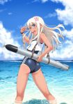  1girl :d ass beach blue_eyes clouds competition_school_swimsuit flower hair_flower hair_ornament kantai_collection long_hair looking_at_viewer nigou ocean open_mouth pose ro-500_(kantai_collection) sailor_collar sky smile solo swimsuit tan tanline torpedo v v_over_eye wading water wet white_hair 