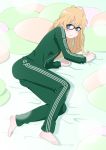  1girl barefoot blonde_hair blue_eyes blush fang highres long_hair long_sleeves looking_at_viewer pants pillow saenai_heroine_no_sodatekata sawamura_spencer_eriri solo tamii_tamii track_suit 