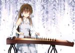  1girl alternate_color bow breasts brown_hair carving cleavage detached_sleeves dress floral_print grey_dress hair_bow hair_tubes hakurei_reimu head_tilt ice-light instrument koto_(instrument) long_hair peaceful playing_instrument ribbon-trimmed_bow ribbon-trimmed_collar ribbon-trimmed_sleeves ribbon_trim sarashi simple_background sitting sleeveless smile solo touhou very_long_hair white_background yin_yang 