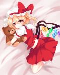  1girl blonde_hair closed_mouth fang flandre_scarlet hair_between_eyes highres ma-a mob_cap red_eyes red_ribbon ribbon short_hair short_sleeves solo stuffed_animal stuffed_toy teddy_bear touhou 