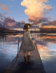  1girl blue_sky boots brown_boots building clouds coat dock facing_away hanno highres long_sleeves looking_to_the_side original reflection scenery short_hair sky sleeves_past_wrists solo tree utility_pole_(object) walking water wind 