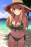  1girl beach bikini blonde_hair blush breasts cleavage flower front-tie_top green_bikini green_eyes hair_between_eyes hat hoshii_miki idolmaster kurokin leaning_forward long_hair looking_at_viewer navel payot side-tie_bikini smile solo straw_hat swimsuit wet 