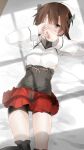  1girl bike_shorts blush brown_hair covering_mouth covering_one_eye kantai_collection lying shade short_hair shorts_under_skirt slaughter_z solo taihou_(kantai_collection) tears 