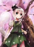  +5cm 1girl blouse blue_eyes bowtie cherry_blossoms cowboy_shot hairband juliet_sleeves katana konpaku_youmu konpaku_youmu_(ghost) long_sleeves looking_at_viewer looking_down petals puffy_sleeves short_hair silver_hair skirt skirt_set smile solo standing sword touhou vest weapon 