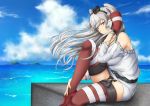  1girl amatsukaze_(kantai_collection) bare_shoulders bol_(liliymimi) brown_eyes clouds garter_straps gloves hair_tubes hair_tucking highres kantai_collection long_hair looking_at_viewer ocean older red_legwear silver_hair sitting solo striped striped_legwear thigh-highs two_side_up white_gloves 