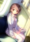  1girl absurdres bag belt blush brown_eyes brown_hair highres light_smile long_hair looking_at_viewer original sitting smile solo striped striped_legwear sunlight takoyaki_(roast) thigh-highs train train_interior white_legwear zettai_ryouiki 