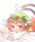  1girl animal_ears brown_eyes brown_hair cat_ears cat_tail chen commentary_request fang green_hat ibarashiro_natou jewelry long_sleeves lying mob_cap multiple_tails nekomata on_stomach open_mouth short_hair single_earring solo tail touhou two_tails 