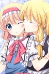  2girls alice_margatroid blonde_hair blue_eyes capelet cheek_kiss hairband incipient_kiss irino kirisame_marisa long_hair multiple_girls short_hair touhou 