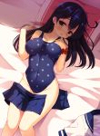  1girl ahoge black_hair blonde_hair blush breasts covered_navel hand_on_own_chest highres impossible_clothes impossible_swimsuit kantai_collection long_hair looking_at_viewer lying on_back on_bed one-piece_swimsuit pillow polka_dot polka_dot_swimsuit skirt skirt_removed solo swimsuit ushio_(kantai_collection) yuzu_modoki 