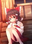  1girl bare_shoulders beni_shake bow box brown_eyes brown_hair detached_sleeves donation_box dress hair_bow hair_tubes hakurei_reimu hakurei_shrine long_sleeves looking_at_viewer panties pantyshot pantyshot_(sitting) red_dress sitting sitting_on_stairs solo stairs touhou underwear white_panties wide_sleeves 