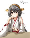  1girl bare_shoulders black_hair brown_eyes chin_rest detached_sleeves elbow_rest fuyu_mi hair_ornament hairband hairclip haruna_(kantai_collection) headgear highres japanese_clothes jewelry kantai_collection light_smile long_hair looking_down nontraditional_miko ring smile solo wedding_ring 