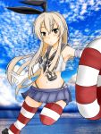  1girl :o armpits black_eyes blonde_hair blush clouds cloudy_sky elbow_gloves gloves hair_ornament hair_ribbon highres kantai_collection lifebelt long_hair midriff miniskirt ocean real_world_location ribbon shimakaze_(kantai_collection) skirt sky solo striped striped_legwear thigh-highs white_gloves zettai_ryouiki 