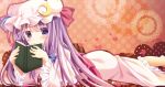  1girl blush book crescent_hair_ornament hair_ornament hat heart hidden_mouth long_hair lying moi_(licoco) on_stomach patchouli_knowledge purple_hair sash solo touhou violet_eyes wide_sleeves 
