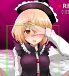  1girl bed_sheet blonde_hair blush covering_one_eye han_(jackpot) hand_on_own_face hat lunasa_prismriver out_of_frame recording short_hair solo_focus touhou upper_body viewfinder yellow_eyes 