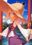  1girl blonde_hair blue_eyes blush cattail hair_ribbon hat ibuki_notsu lake long_sleeves looking_at_viewer moriya_suwako plant ribbon short_hair sidelocks solo touhou water wide_sleeves 