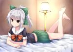  1girl absurdres bangs bare_legs bed bed_sheet blunt_bangs bow brown_eyes crossed_arms full_body green_bow hair_bow high_ponytail highres indoors iwashi_(nisankatanso) kantai_collection knees_apart_feet_together lamp lampshade large_bow legs_up light_smile looking_at_viewer lying midriff on_stomach pleated_skirt ponytail school_uniform serafuku short_hair short_sleeves sidelocks silver_hair skirt solo tsurime yuubari_(kantai_collection) 