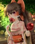  1girl alternate_costume black_hair bow candy_apple festival fireworks floral_print hair_bow hair_tubes hakurei_reimu highres indo_(mdtanaka2007) japanese_clothes kimono looking_at_viewer obi ponytail red_eyes sash solo touhou tree wide_sleeves 