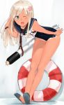  1girl blonde_hair blush japanese_flag kantai_collection life_preserver long_hair one_eye_closed open_mouth poco_(backboa) propeller ro-500_(kantai_collection) school_swimsuit solo swimsuit tan tanline torpedo 