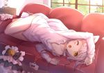  1girl animal_ears arm_up bare_legs barefoot bell byakuya_reki cat_ears collarbone couch doll long_hair long_sleeves lying naked_shirt on_couch on_side one_eye_closed original shirt silver_hair solo very_long_hair window yawning yellow_eyes 