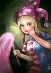  1girl akanbe american_flag_shirt amibazh blonde_hair breasts clownpiece eyebrows eyes fairy_wings green_background hat jester_cap light lips long_hair looking_at_viewer nose red_eyes short_sleeves solo tongue tongue_out torch touhou very_long_hair wings 