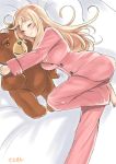  1girl artist_name atago_(kantai_collection) bed blonde_hair breasts cleavage closed_eyes kantai_collection long_hair lying on_side pajamas pillow sensen smile solo stuffed_animal stuffed_toy teddy_bear 