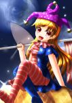  1girl :d american_flag american_flag_legwear american_flag_shirt arm_support blonde_hair blue_background clownpiece fairy_wings flagpole glint hat highres jester_cap long_hair looking_at_viewer no_shoes open_mouth red_eyes sitting_on_rock smile solo soran_(torarnworld) touhou wings 