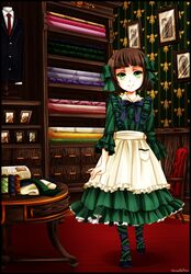  1girl artist_name bangs black_border book border bow brown_hair derivative_work drawer dress formal green_dress green_eyes hair_ribbon highres indoors kuroshitsuji looking_at_viewer necktie photo_(object) ribbon shelf short_hair sieglinde_sullivan signature smile solo string suit table vermeillerose wallpaper_(object) 