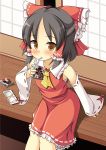  1girl absurdres bare_shoulders black_hair blush bow cookie_(touhou) detached_sleeves dress drinking drinking_straw eating hair_bow hair_ribbon hair_tubes hakurei_reimu hakurei_shrine highres juice_box large_bow looking_at_viewer ribbon ribbon-trimmed_sleeves ribbon_trim sananana sarashi short_hair shouji sitting sliding_doors solo szk touhou yellow_eyes 