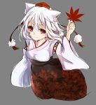 1girl animal_ears blush grey_background hat highres inubashiri_momiji japanese_clothes leaf long_sleeves looking_at_viewer maple_leaf pom_pom_(clothes) red_eyes shirt short_hair simple_background skirt smile solo string tail tohochang tokin_hat touhou white_hair wide_sleeves wolf_ears wolf_tail 