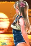  1girl blonde_hair blue_eyes crop_top flower hair_flower hair_ornament highres kantai_collection long_hair ro-500_(kantai_collection) sailor_collar school_swimsuit sunset swimsuit swimsuit_under_clothes tan tanline ugeppa 
