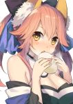  1girl animal_ears bare_shoulders blush breasts caster_(fate/extra) cleavage fate_(series) food holding_food nikuman open_mouth pink_hair shironboako solo upper_body white_background yellow_eyes 
