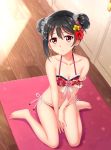  1girl barefoot bikini black_hair blush collarbone double_bun earrings floral_print flower hair_bun hair_flower hair_ornament highres jewelry looking_at_viewer love_live!_school_idol_project red_bikini red_eyes scrunchie sitting solo swimsuit tucana wariza yazawa_nico 