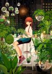  1girl apron balcony bangs blunt_bangs bonsai book bookmark bowl building chair city garden glass green_eyes highres holding lamp leaf long_hair long_sleeves looking_at_viewer night night_sky original pencil_skirt plant potted_plant red_legwear red_shoes redhead shoes sitting sitting_on_chair skirt sky sneakers socks solo sumomo_(woooooxoxo) sweater turtleneck vines water 