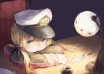  1girl :/ airmail_envelope anchor_hair_ornament blonde_hair chair chin_rest crossed_arms desk desk_lamp green_eyes hair_ornament hat inkwell kantai_collection long_hair looking_at_viewer military military_uniform peaked_cap prinz_eugen_(kantai_collection) quill roll_okashi solo twintails uniform 