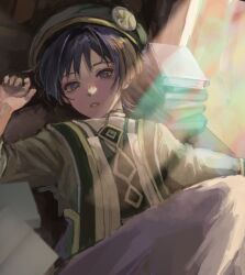  1boy akademiya_uniform alternate_costume arm_at_side beret book book_stack bright_pupils chest_jewel curled_fingers emblem eyeliner eyeshadow gem genshin_impact gold_trim green_gemstone green_hat green_jacket green_sleeves hat highres itogens jacket knee_up long_sleeves looking_at_viewer lying makeup male_focus on_back open_clothes open_jacket open_mouth purple_hair red_eyeliner red_eyeshadow scaramouche_(genshin_impact) sidelighting solo violet_eyes watercolor_effect white_mouth white_pupils wispy_bangs 