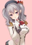  1girl blush ebiebiebio finger_to_mouth gloves grey_eyes grey_hair hat heart heart-shaped_pupils highres kantai_collection kashima_(kantai_collection) looking_at_viewer pink_background short_hair simple_background smile solo symbol-shaped_pupils twintails white_gloves 