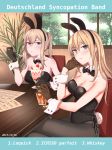  2015 2girls alternate_costume animal_costume animal_ears bangs bare_shoulders bismarck_(kantai_collection) black_bowtie black_gloves black_legwear black_leotard black_ribbon blonde_hair blue_eyes bunny_costume bunny_tail closed_mouth crossed_legs cup dated detached_collar drink drinking_glass eyebrows eyebrows_visible_through_hair fake_animal_ears food food_in_mouth fruit gloves graf_zeppelin_(kantai_collection) hand_on_own_cheek head_tilt highres holding holding_drinking_glass holding_spoon indoors inuhasiru kantai_collection long_hair multiple_girls palm_tree pantyhose parfait plant potted_plant rabbit_ears ribbon sheet_music side-tie_leotard sitting sitting_on_chair smile strawberry tail text tree window wooden_table wrist_cuffs 