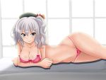  1girl breast_press breasts cleavage crossed_arms hat kantai_collection kashima_(kantai_collection) large_breasts lingerie looking_at_viewer lying midriff navel on_stomach silver_hair smile solo tk_(butakuma) twintails underwear wavy_hair 