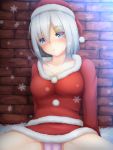  1girl alternate_costume arm_support blue_eyes blush brick_wall christmas gengodou hair_ornament hair_over_one_eye hairclip hamakaze_(kantai_collection) hat highres kantai_collection looking_at_another panties pantyshot pantyshot_(sitting) santa_costume santa_hat short_hair silver_hair sitting underwear 