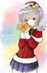  1girl aran_sweater ashiya_hiro bell blue_eyes box capelet dated fur_trim gift gift_box hair_bell hair_ornament hat kantai_collection kashima_(kantai_collection) looking_at_viewer merry_christmas pleated_skirt santa_hat short_twintails silver_hair skirt smile solo sweater twintails wavy_hair 