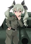  1girl anchovy arm_support belt black_shirt carro_armato_p40 cowboy_shot dress_shirt drill_hair finger_to_mouth girls_und_panzer green_hair hair_ribbon hand_on_hip holding jacket leaning long_hair looking_at_viewer military military_uniform military_vehicle necktie pants red_eyes ribbon riding_crop sakurai_tene shirt smile solo standing tank twin_drills twintails uniform vehicle white_background 