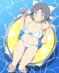  bikini black_hair blue_eyes blush bow breasts candy from_above front-tie_top hair_bow innertube large_breasts lollipop looking_at_viewer looking_up navel outdoors partially_submerged senran_kagura_(series) side-tie_bikini swimsuit white_bikini white_swimsuit yaegashi_nan yumi_(senran_kagura) 