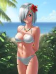  1girl arms_behind_back bikini blue_eyes blue_sky blurry bokeh breasts cleavage cowboy_shot depth_of_field eno_ti_deng flower hair_flower hair_ornament hair_over_one_eye hairclip hamakaze_(kantai_collection) hibiscus highres kantai_collection large_breasts light_smile looking_at_viewer navel outdoors palm_tree short_hair silver_hair sky solo strap_gap swimsuit tree tree_branch white_bikini white_swimsuit 