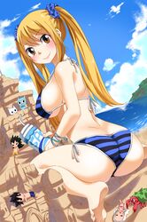  1girl absurdres ass beach bikini blonde_hair blue_bikini blush breasts brown_eyes fairy_tail from_behind highres large_breasts looking_at_viewer looking_back lucy_heartfilia miniboy planeptune sand_castle sand_sculpture side-tie_bikini sideboob smile striped striped_bikini striped_swimsuit swimsuit twintails 