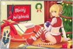  1girl ahoge avalon_(fate/stay_night) blonde_hair candy candy_cane christmas christmas_ornaments christmas_tree curtains elbow_gloves excalibur fate/stay_night fate_(series) gift gloves green_hair highres saber solo striped striped_legwear thigh-highs wreath yurix 