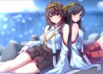  2girls antennae back-to-back bare_shoulders black_hair blue_sky brown_eyes brown_hair clouds detached_sleeves hakama haruna_(kantai_collection) headgear highres japanese_clothes kantai_collection kongou_(kantai_collection) long_sleeves looking_at_viewer miko multiple_girls nicoby ocean shirt sitting skirt sky smile wide_sleeves 